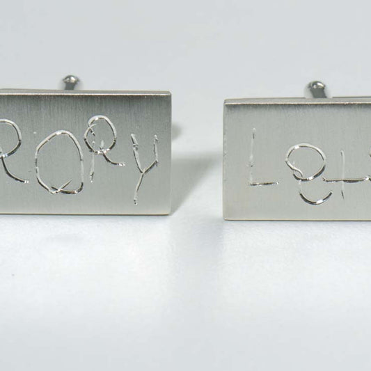 Handmade silver cufflinks with hand engraving