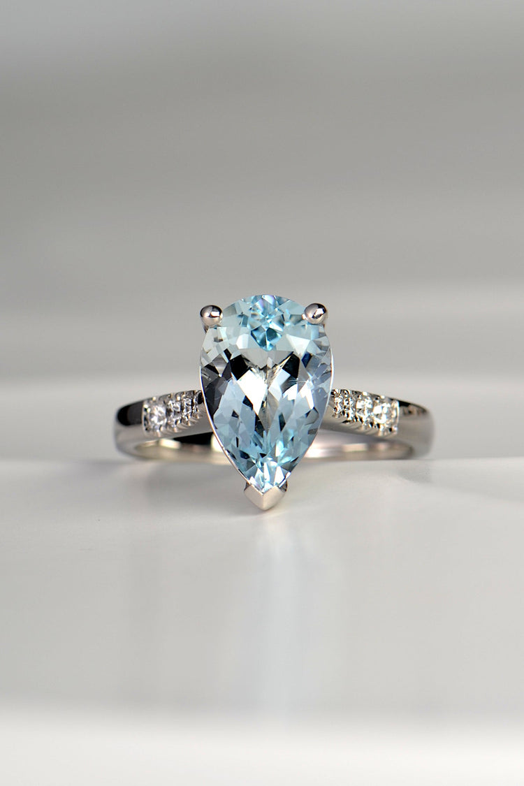 large pear cut aquamarine platinum ring with diamond shoulders - Christine Sadler UK