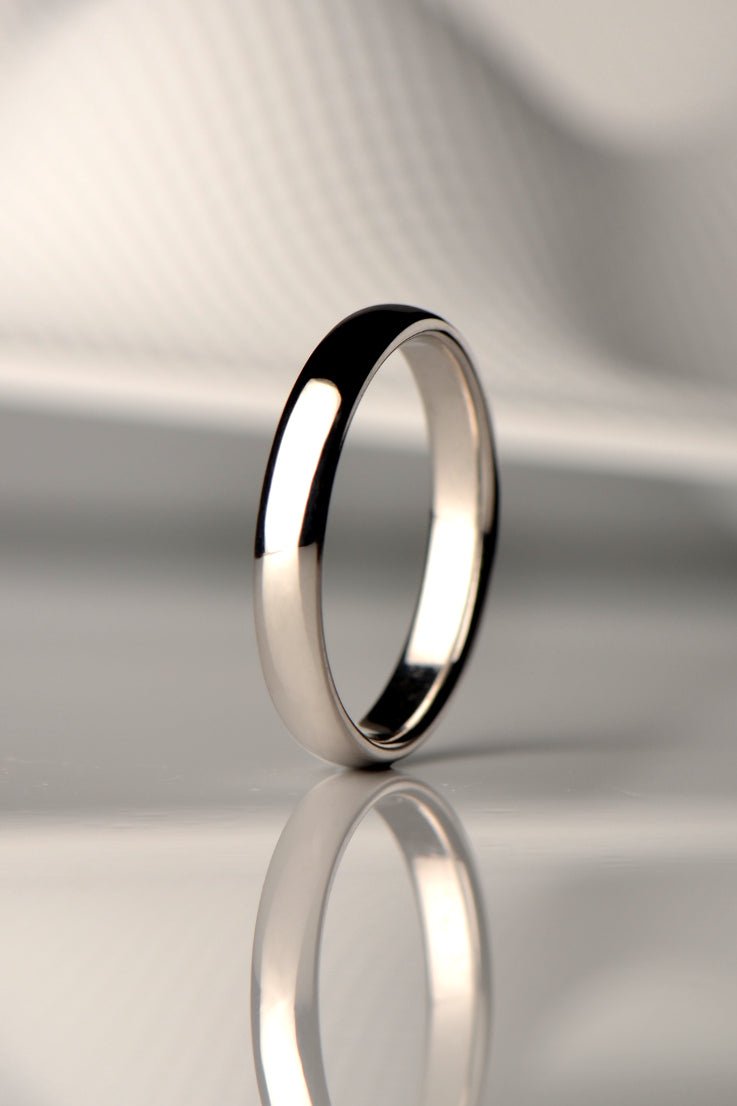 narrow platinum wedding ring for a man or woman that is made in the UK and affordable