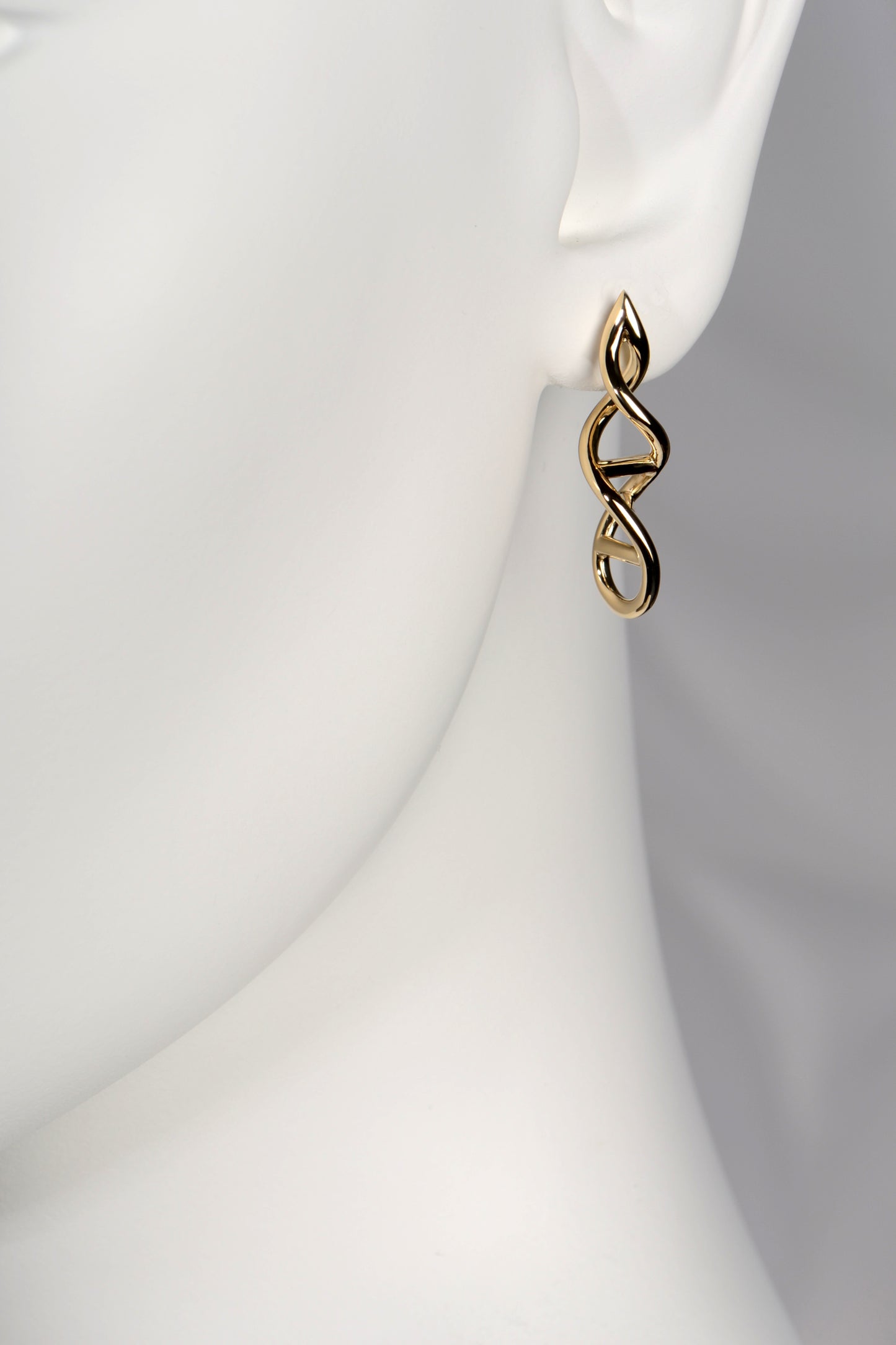 9ct gold Life earrings shown on mannequin to display scale, shape, and elegant drop length.