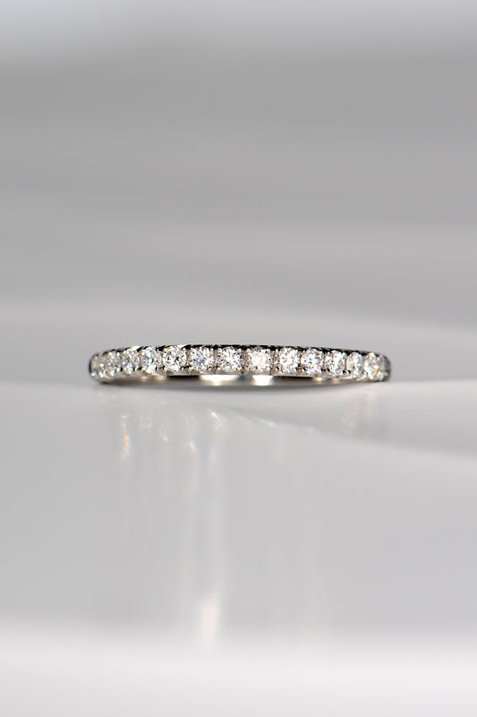 Diamond set eternity or wedding ring with fishtail setting