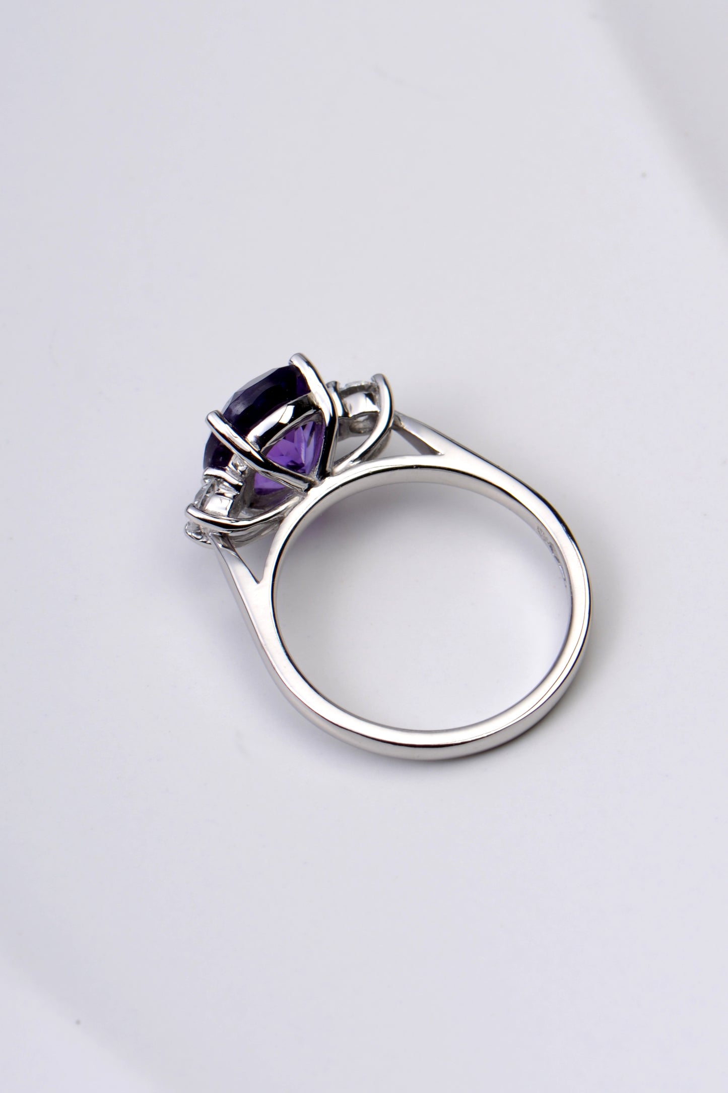 Snuggle fit amethyst and diamond platinum ring