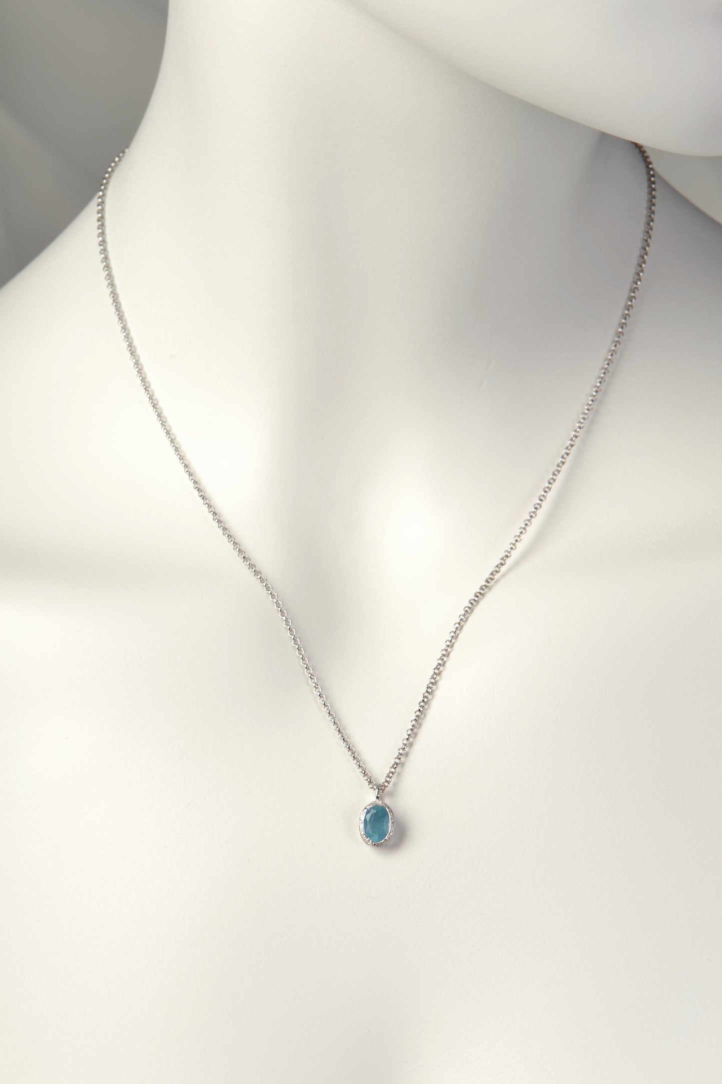 delicate oval aquamarine pendant on a sterling silver chain from jewellery designer Jorge Revilla