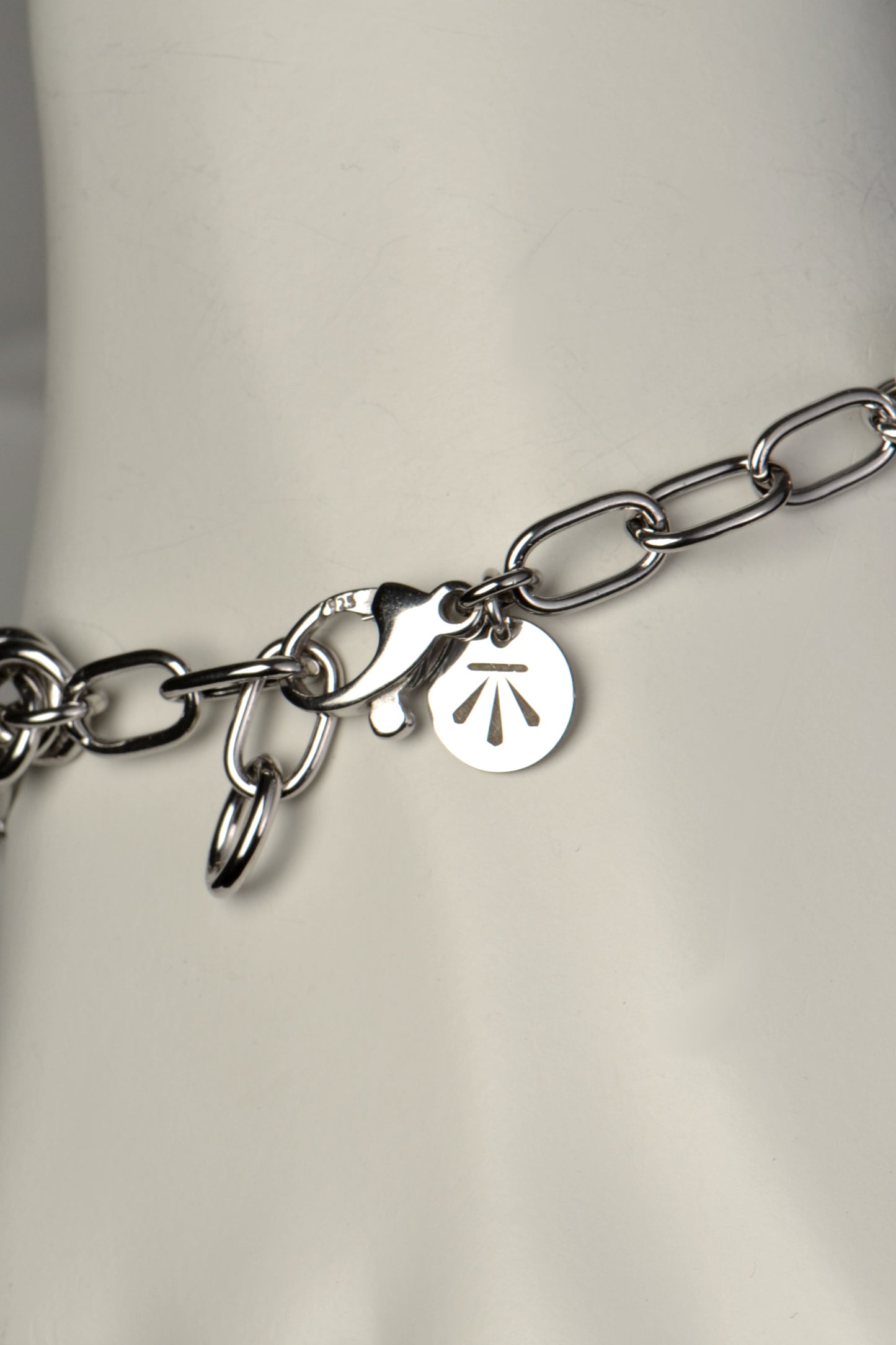 silver designer bracelet that is adjustable in length