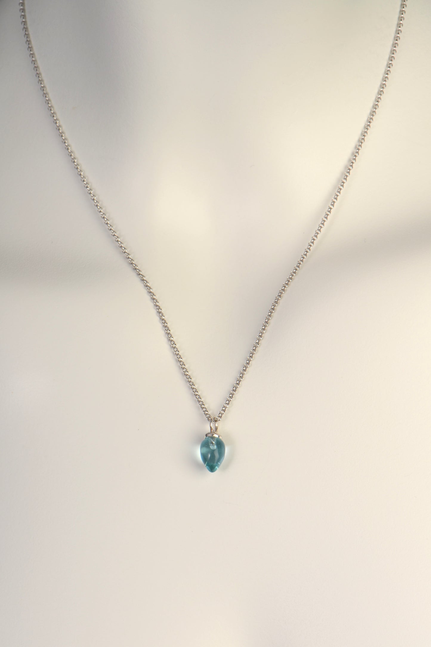 real gemstone and silver designer necklaces for women featuring a blue topaz - Jorge Revilla