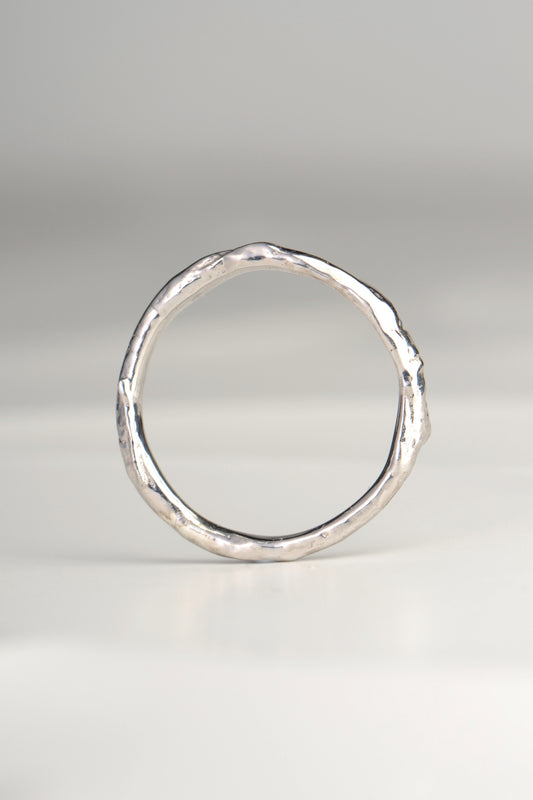 a real silver designer ring that looks like it is made from a branch or twig by jewellery designer Jorge Revilla
