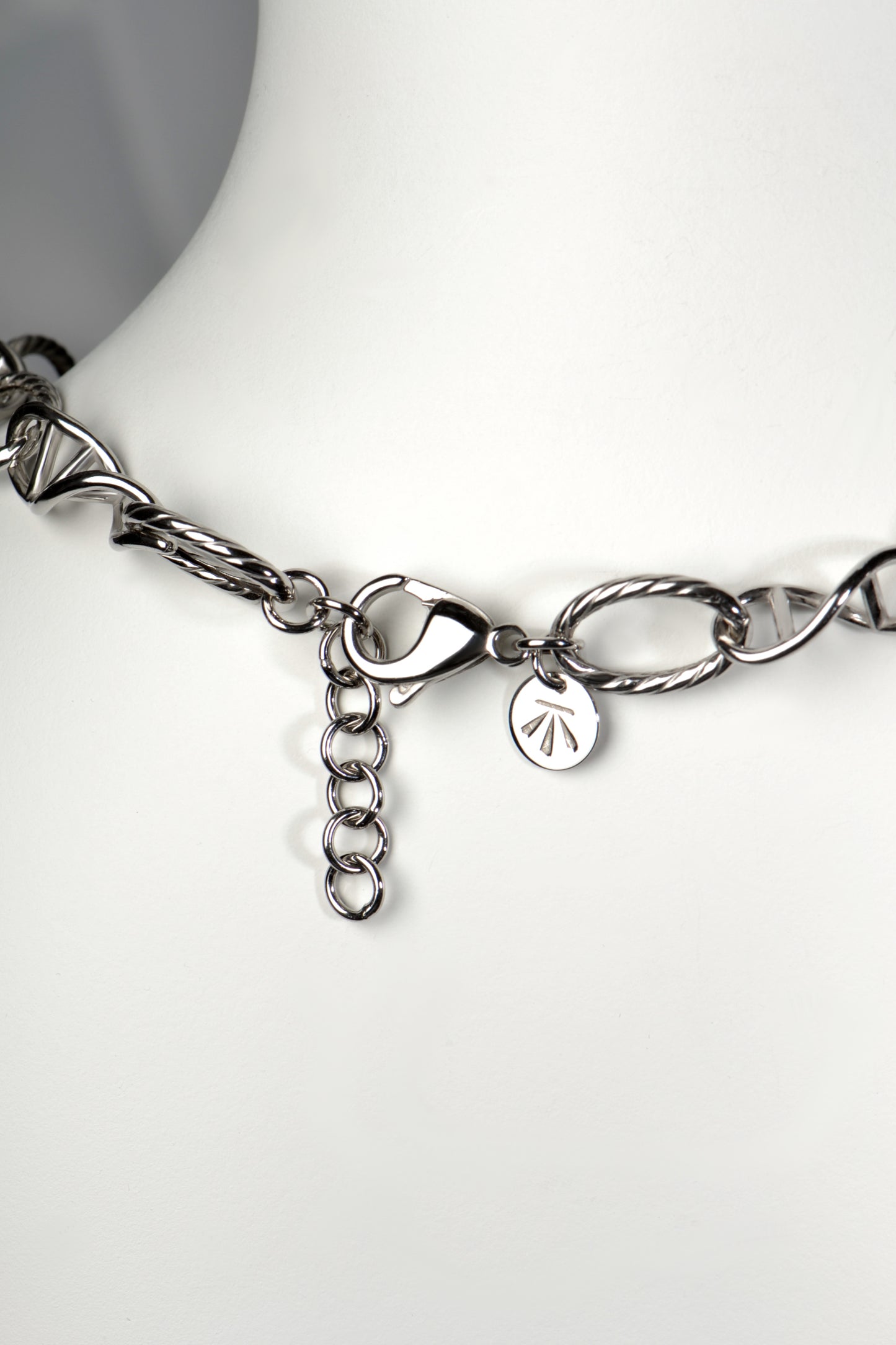 adjustable unusual chain link necklace from UK jewellery designer Christine Sadler Detail of sculptural DNA double helix link in sterling silver, symbolising invisible human connection.
