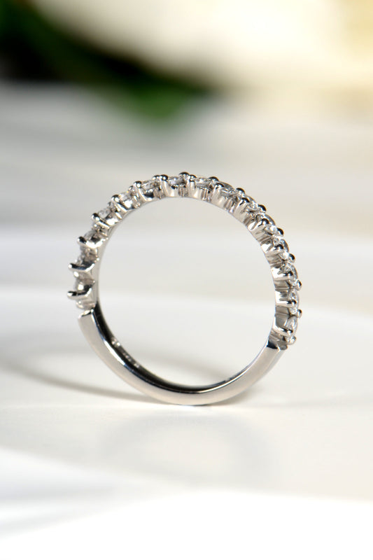 setting detail on slim platinum diamond wedding ring with modern asymmetric claw detail - Christine Sadler