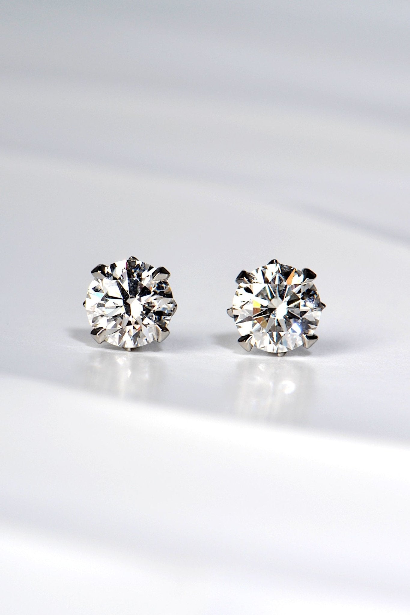 designer two carat platinum lab diamond stud earrings with a flame design - Christine Sadler