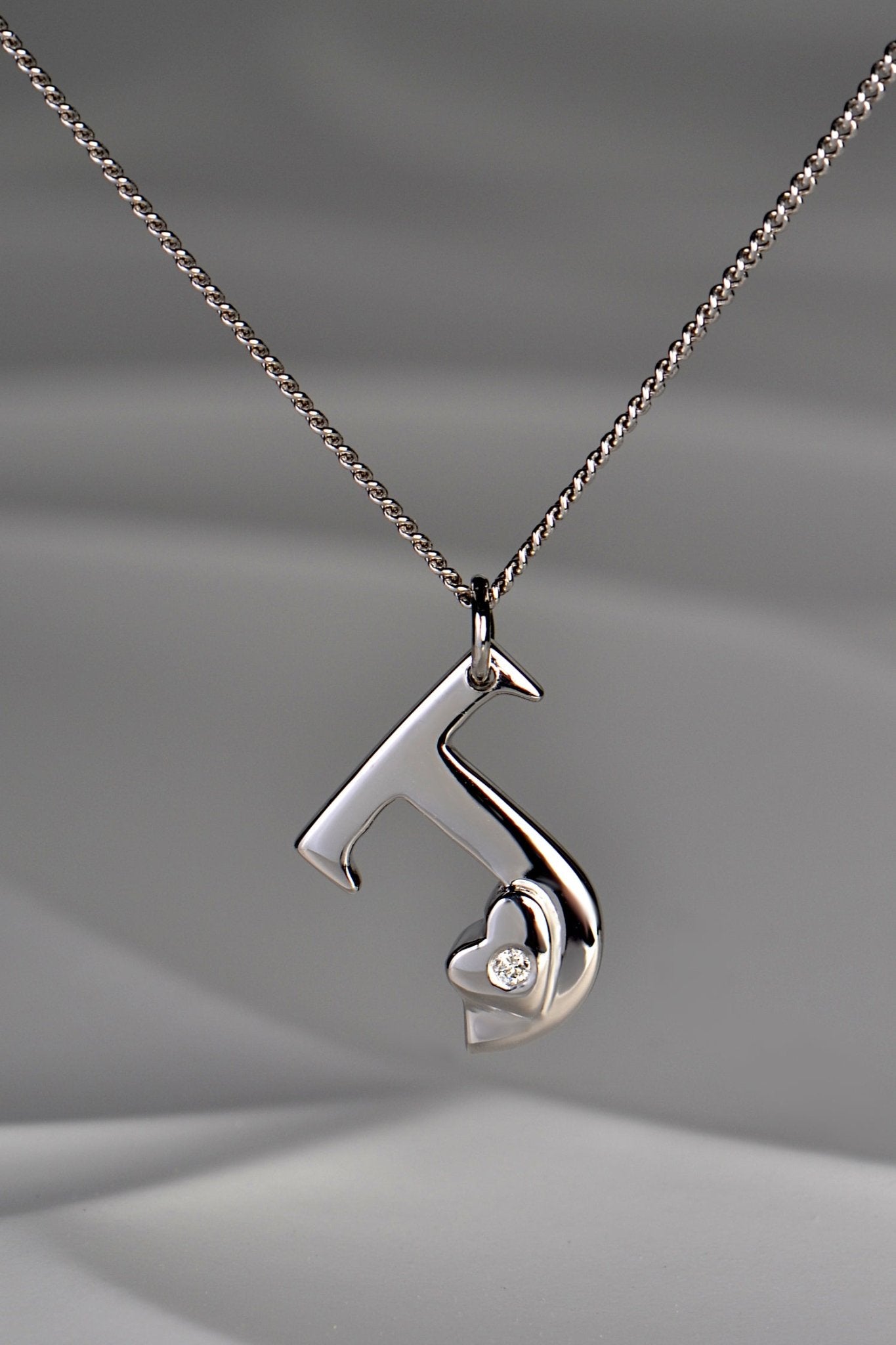 designer white gold and diamond initial necklace by Christine Sadler