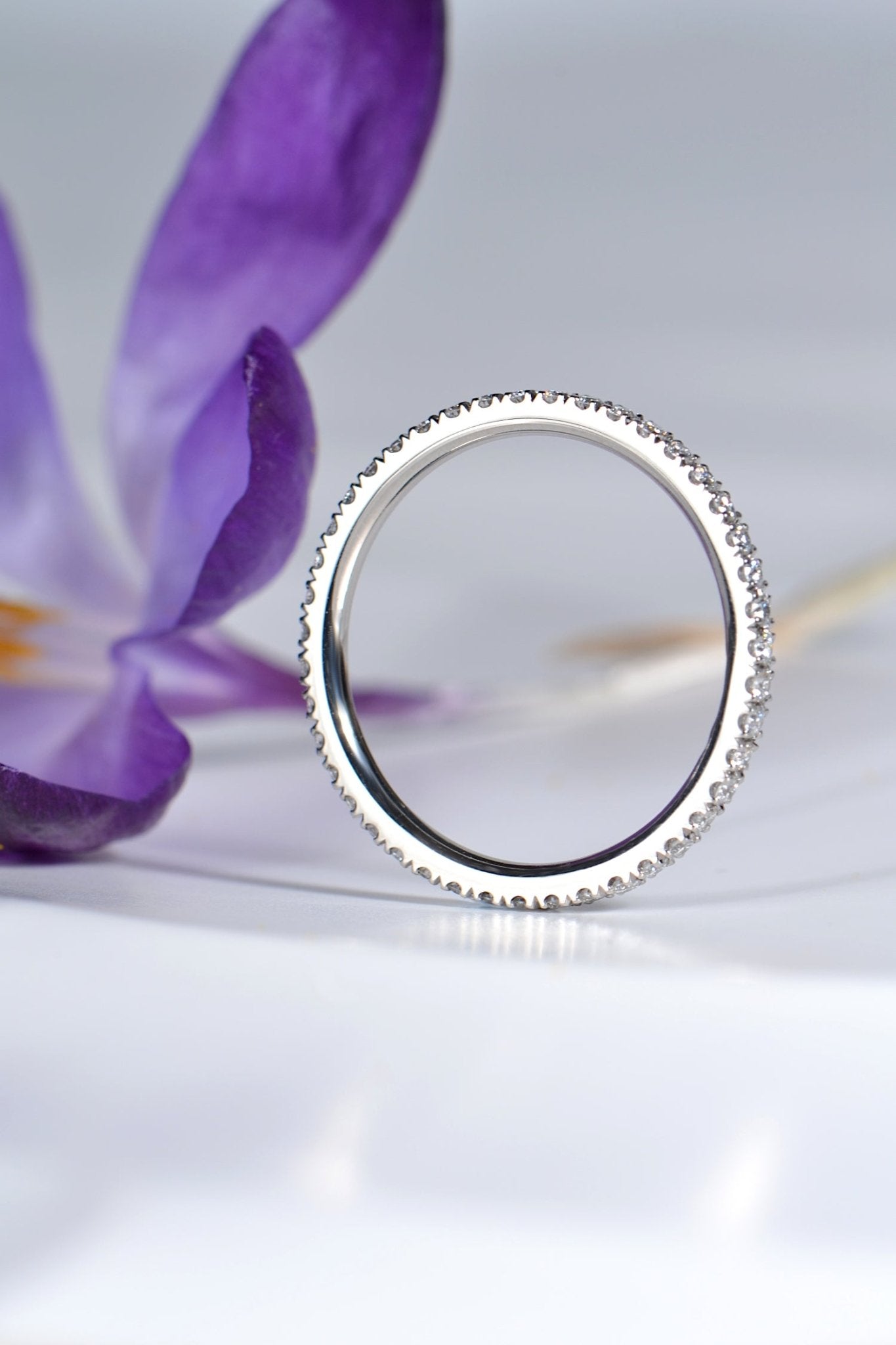 high quality diamond platinum ring with small diamond all the way round