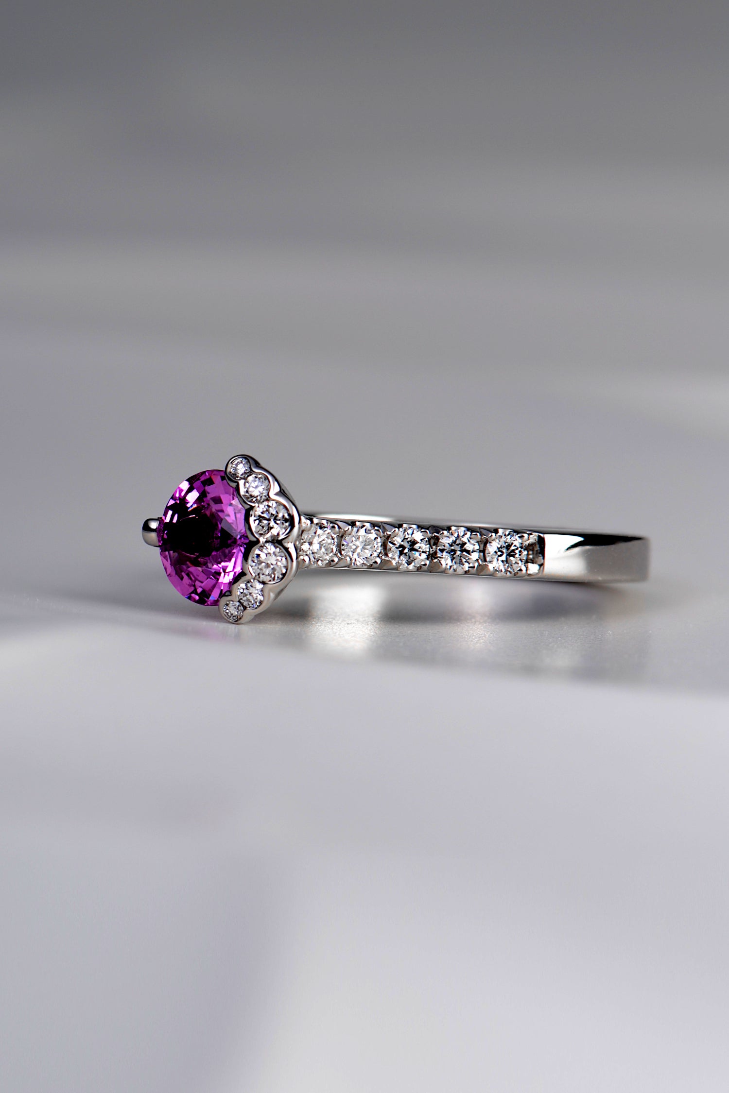 side view of designer platinum, pink sapphire and diamond scottish engagement ring