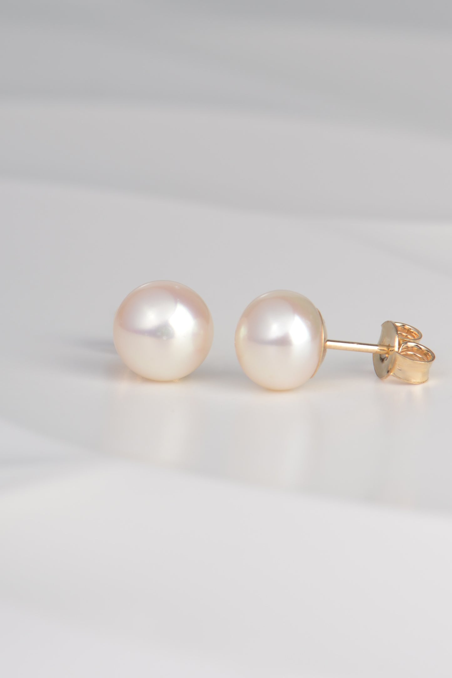 real pearl earrings with gold fittings