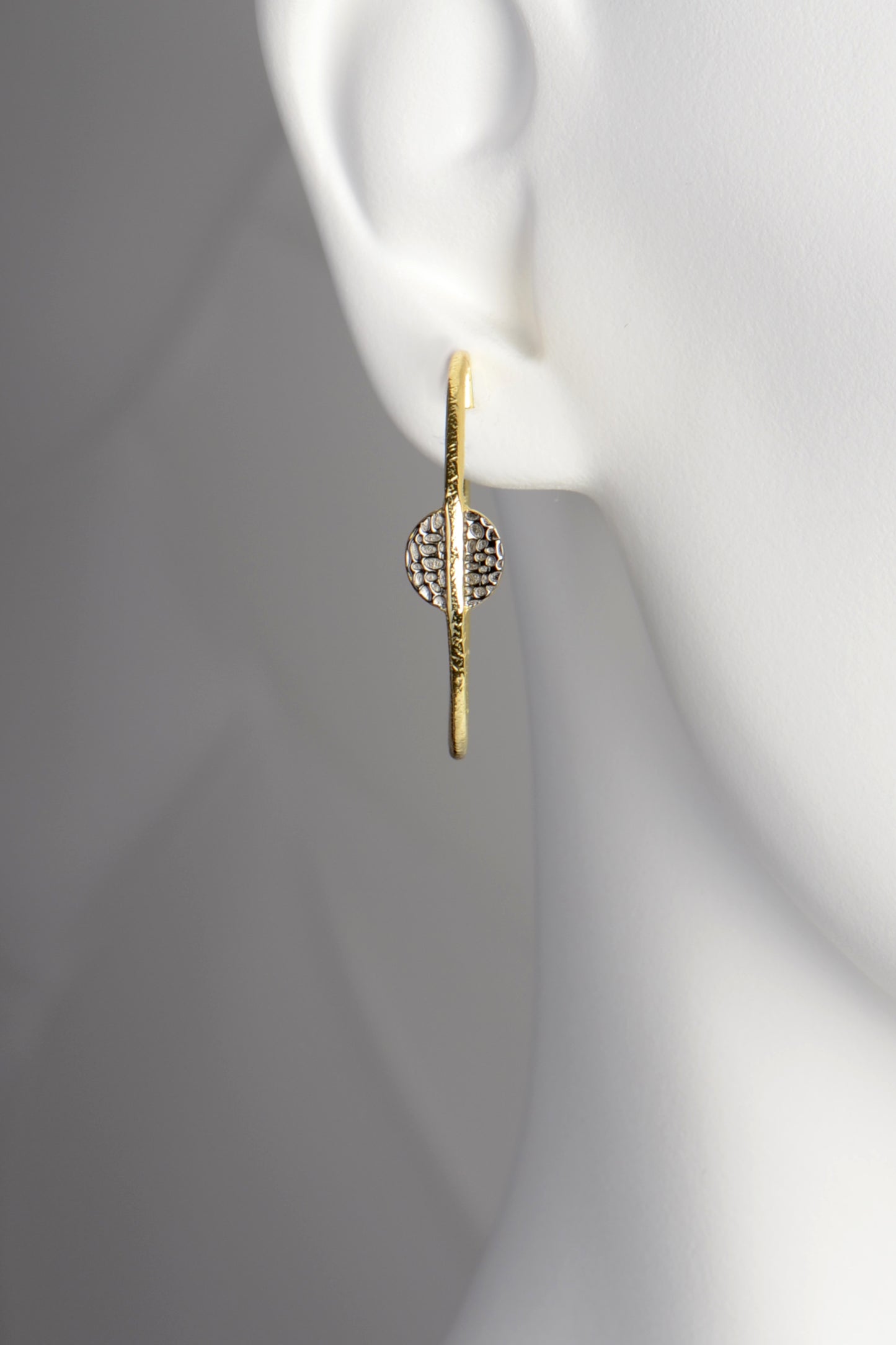 modern stylish large gold vermeil hoop earrings by jewellery designer Jorge Revilla