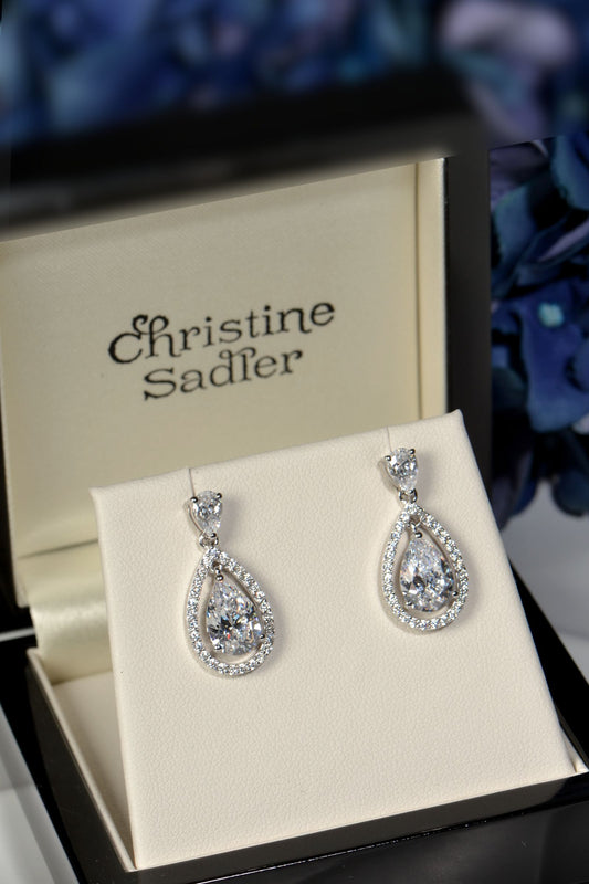 Teardrop-shaped earrings in a Christine Sadler box