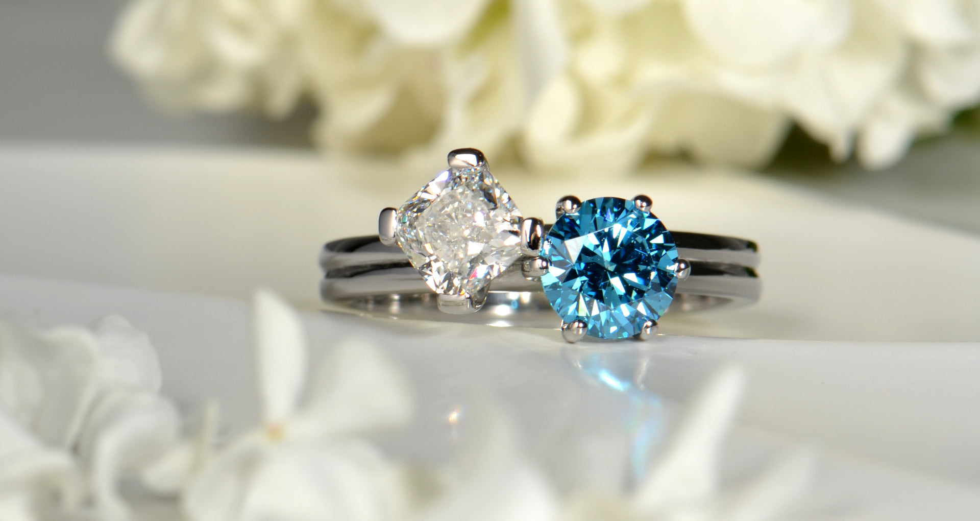 Moi et Toi ring using natural blue diamond and lab-grown white diamond — bespoke ring redesign by Christine Sadler Jewellery