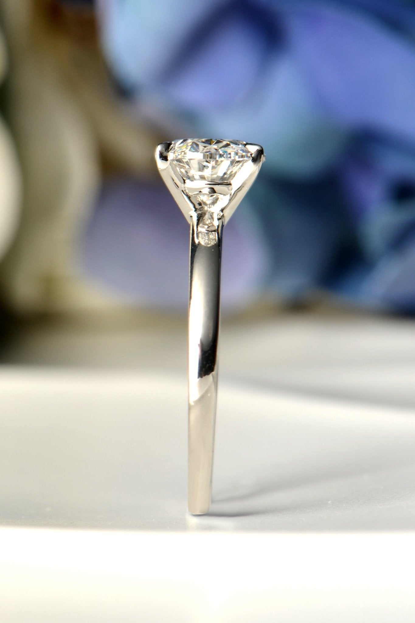 Side view of platinum east–west oval lab-grown diamond ring, highlighting platinum band and contemporary design
