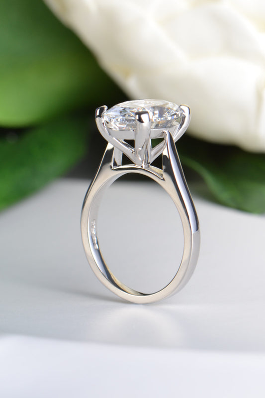 Side profile of platinum oval lab diamond engagement ring designed to sit with straight wedding band - Christine Sadler