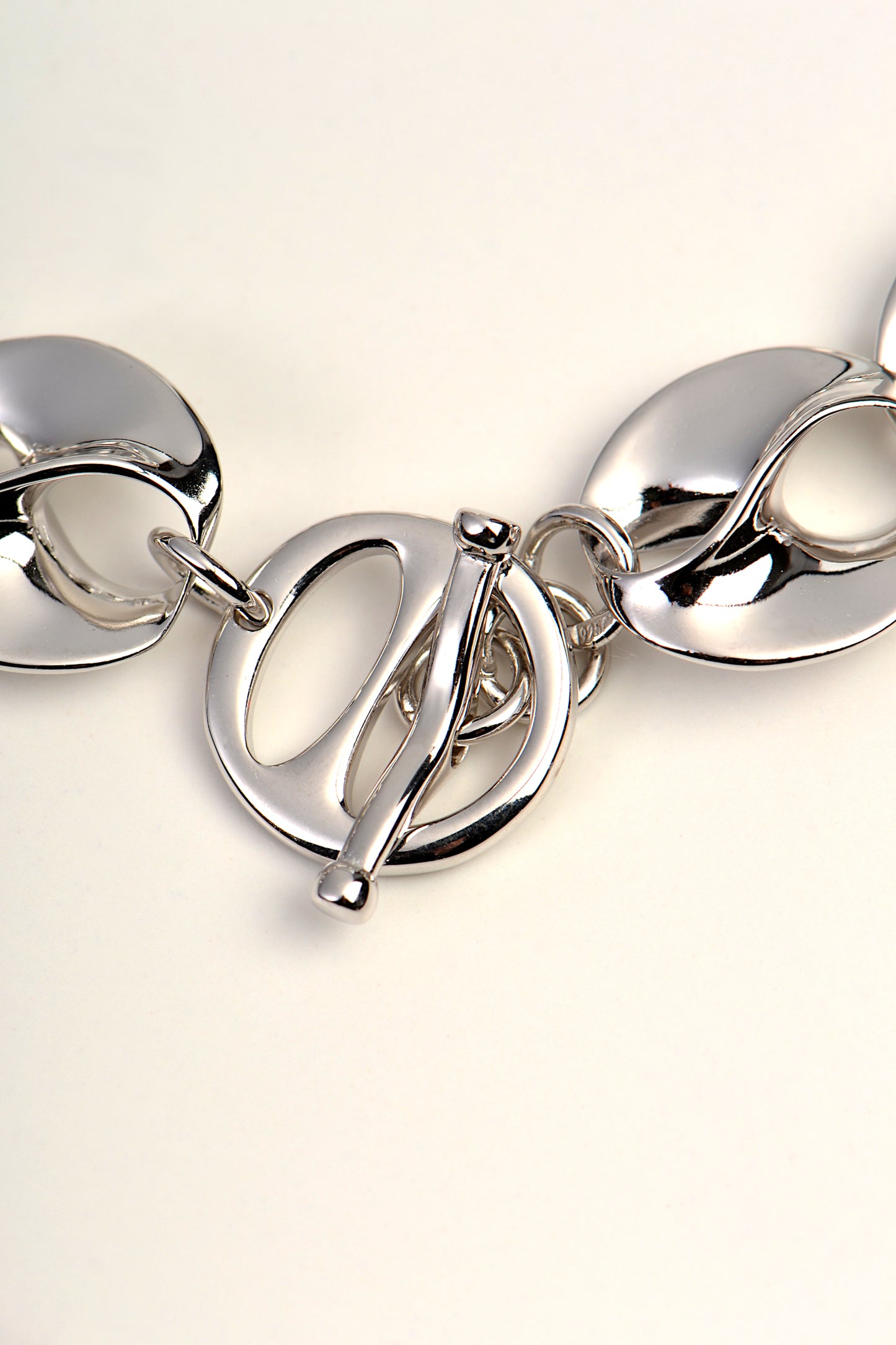 clever sterling silver T bar clasp on a handmade bracelet design that makes the fitting more secure.