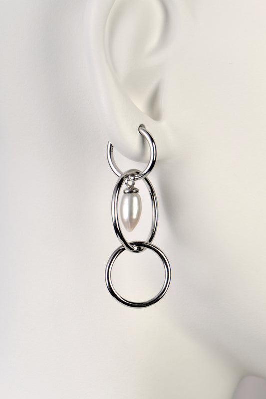 modern pearl and silver long drop earrings by jewellery designer Jorge Revilla
