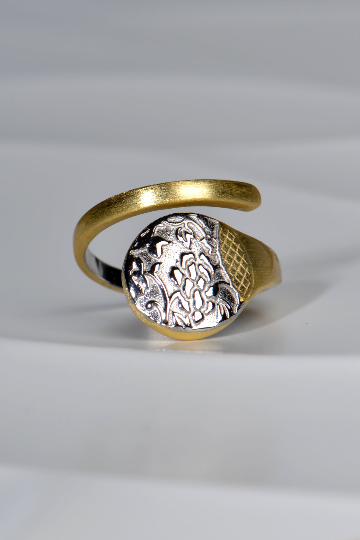 open spiral ring with cherry blossom design sterling silver with 18ct gold plate detail