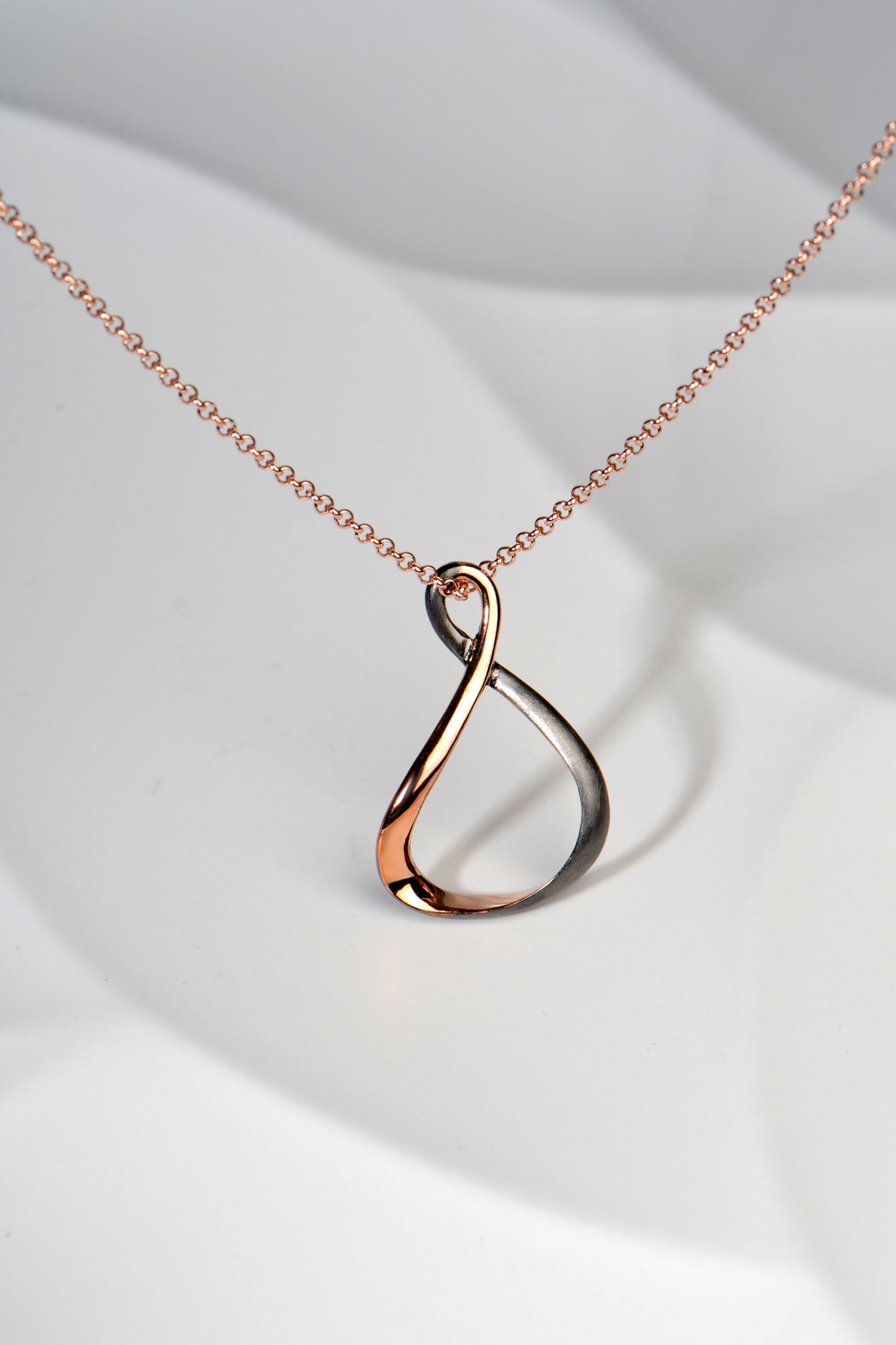 Modern rose gold vermeil necklace with black ruthenium by jewellery designer Jorge Revilla