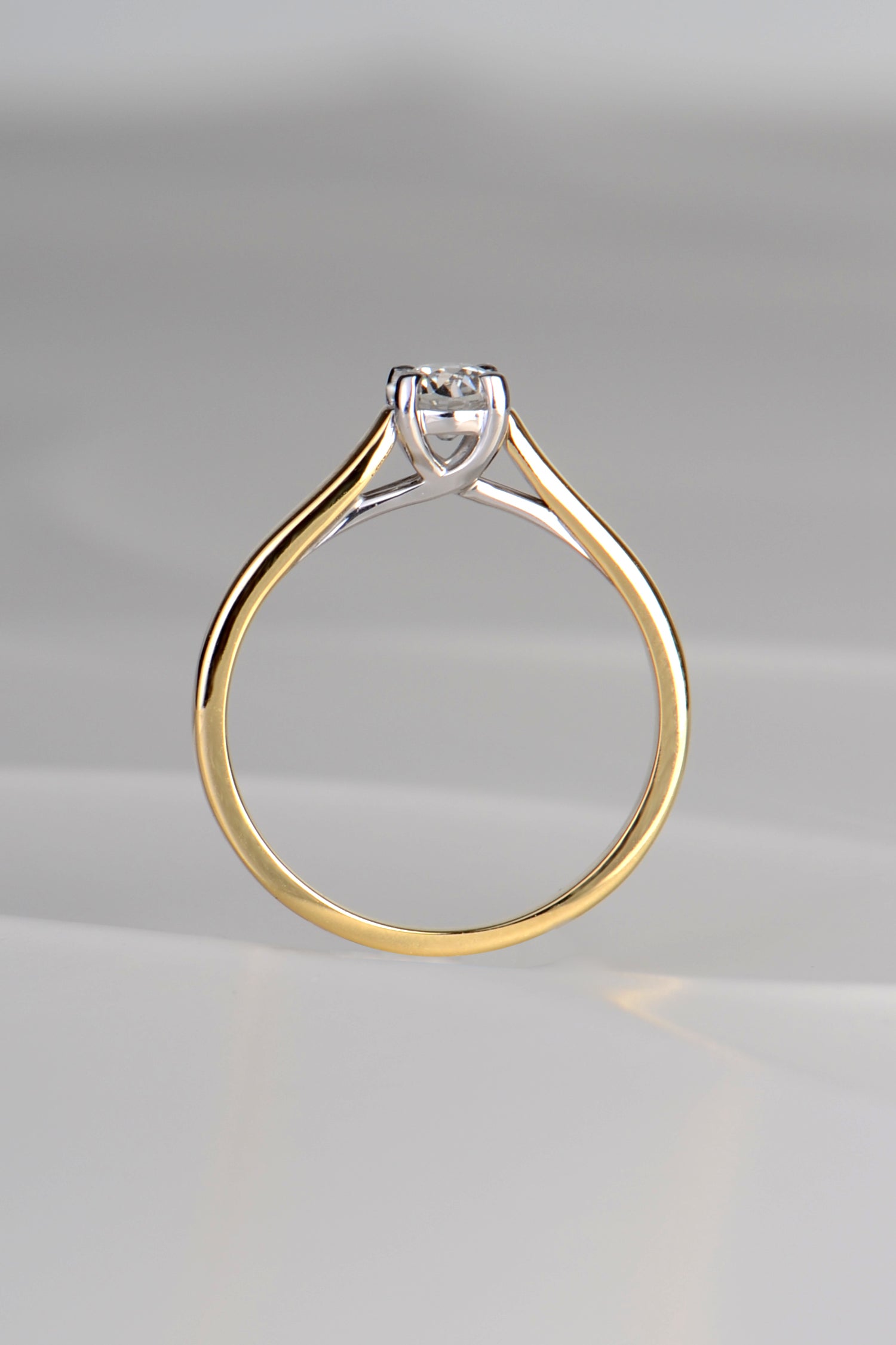 diamond engagement ring made using a old diamond from another ring remodelled into a new ring