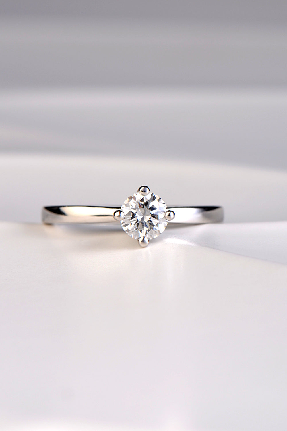 Platinum and diamond solitaire engagement ring