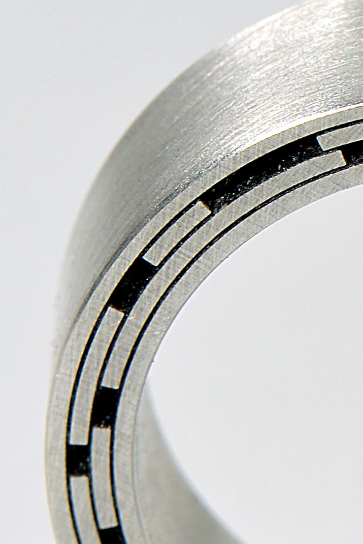 Black and silver limited edition silver designer ring inspired by star trails
