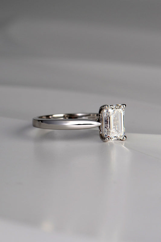 modern designer emerald cut diamond platinum ring by Christine Sadler