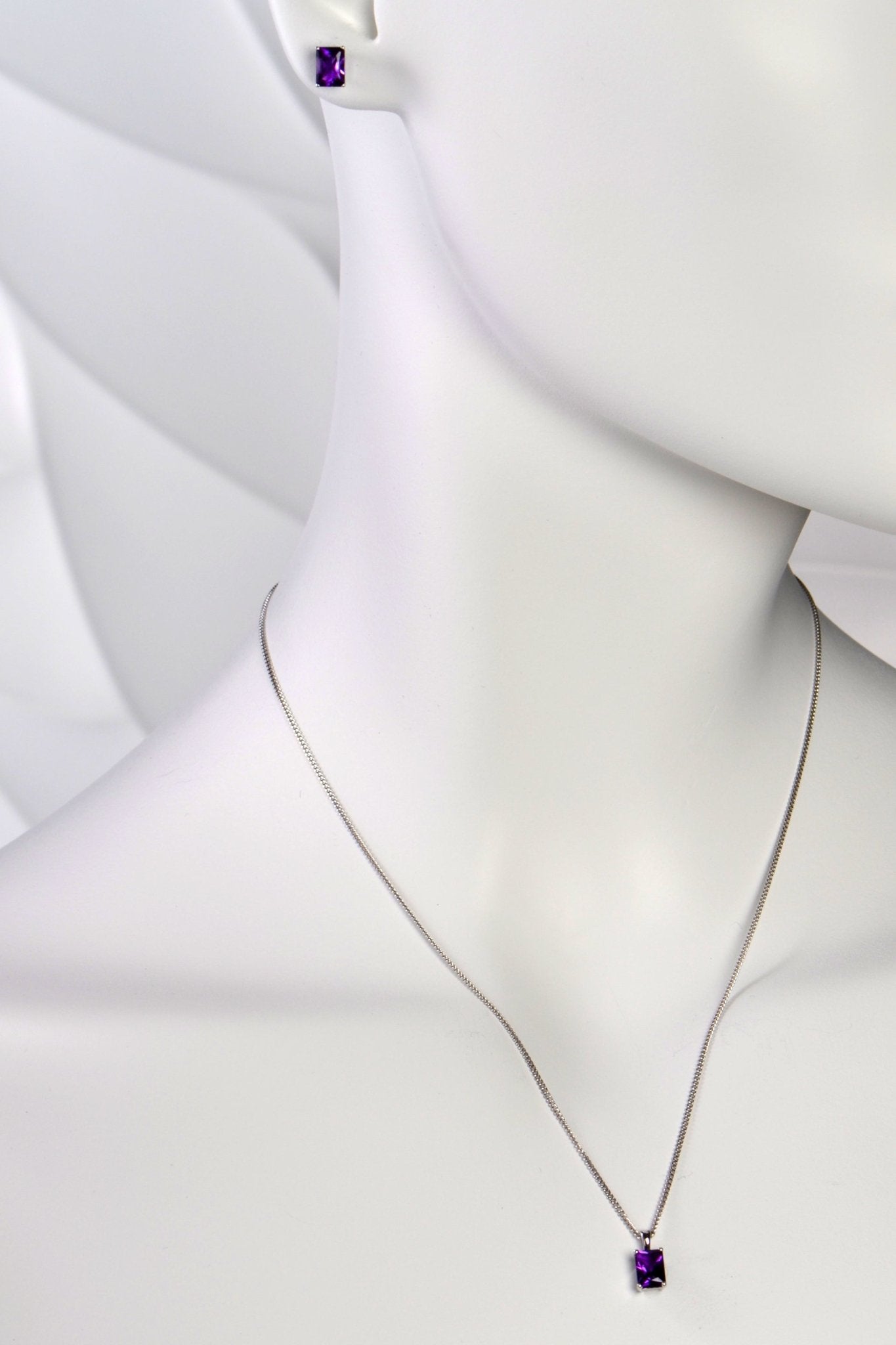 Radiant cut amethyst white gold earrings shown with the matching necklace - Christine Sadler
