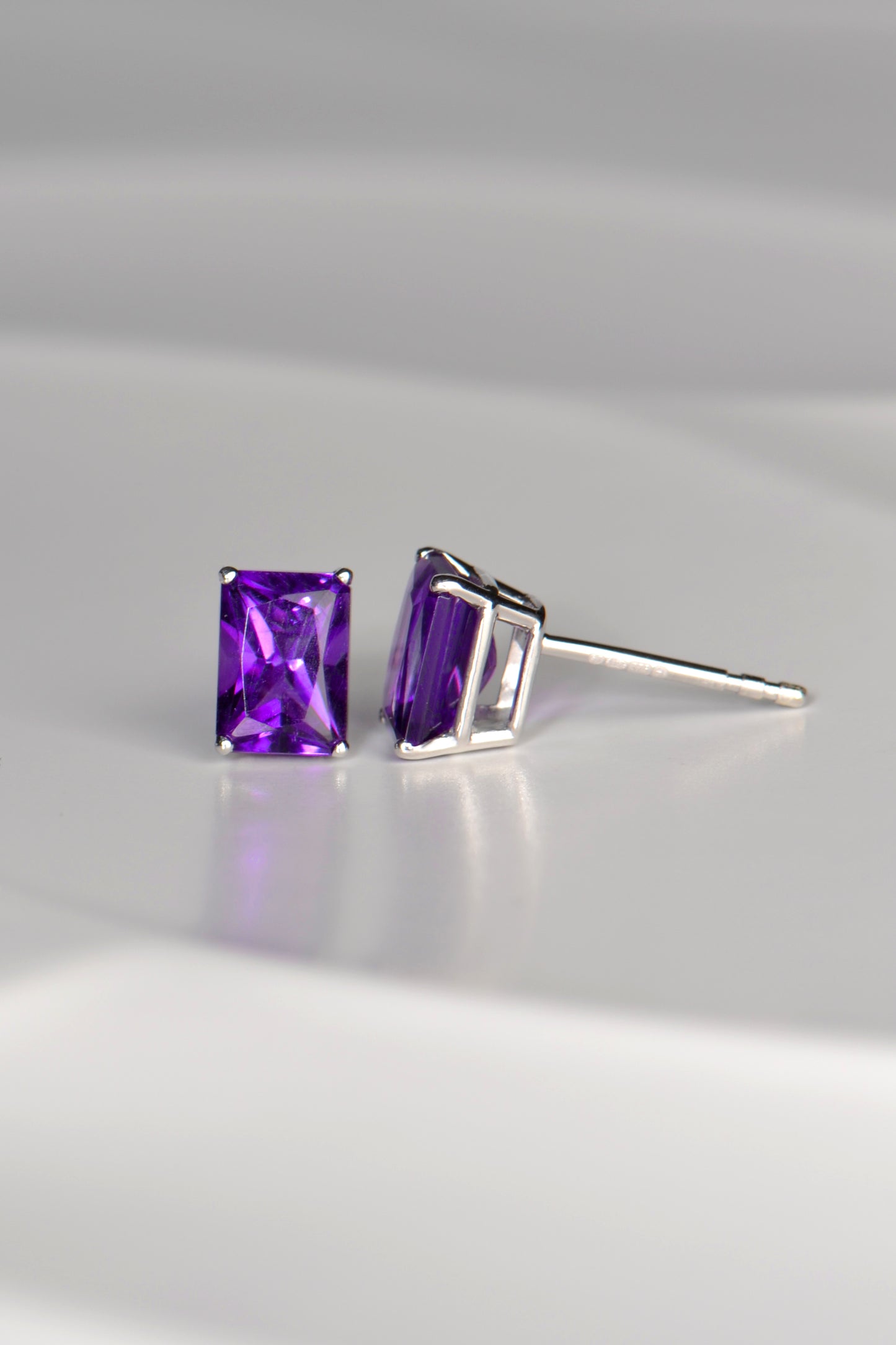 Radiant cut amethyst white gold earrings