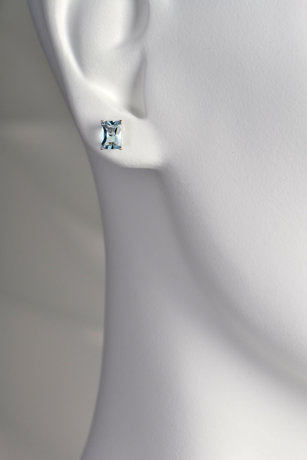 Radiant cut white gold aquamarine earrings