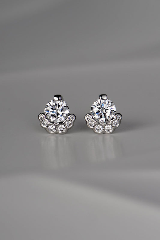 Exclusive designer Platinum Diamond stud earrings that are really different and special, inspired by the Scottish fairy pools