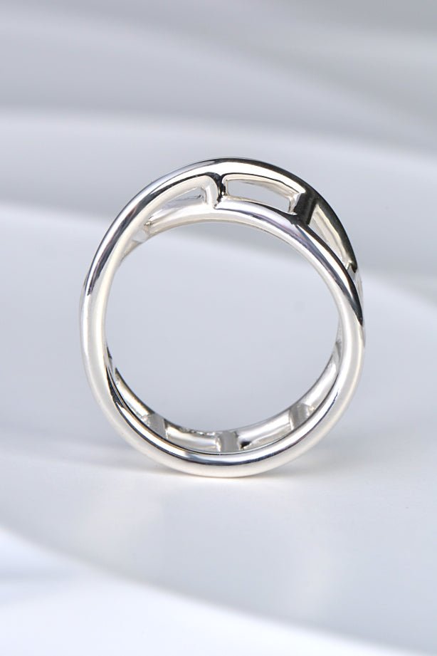 Tapered sterling silver ring rising to 4mm high at the front, with a DNA-inspired twist