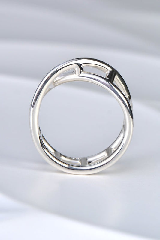 Tapered sterling silver ring rising to 4mm high at the front, with a DNA-inspired twist