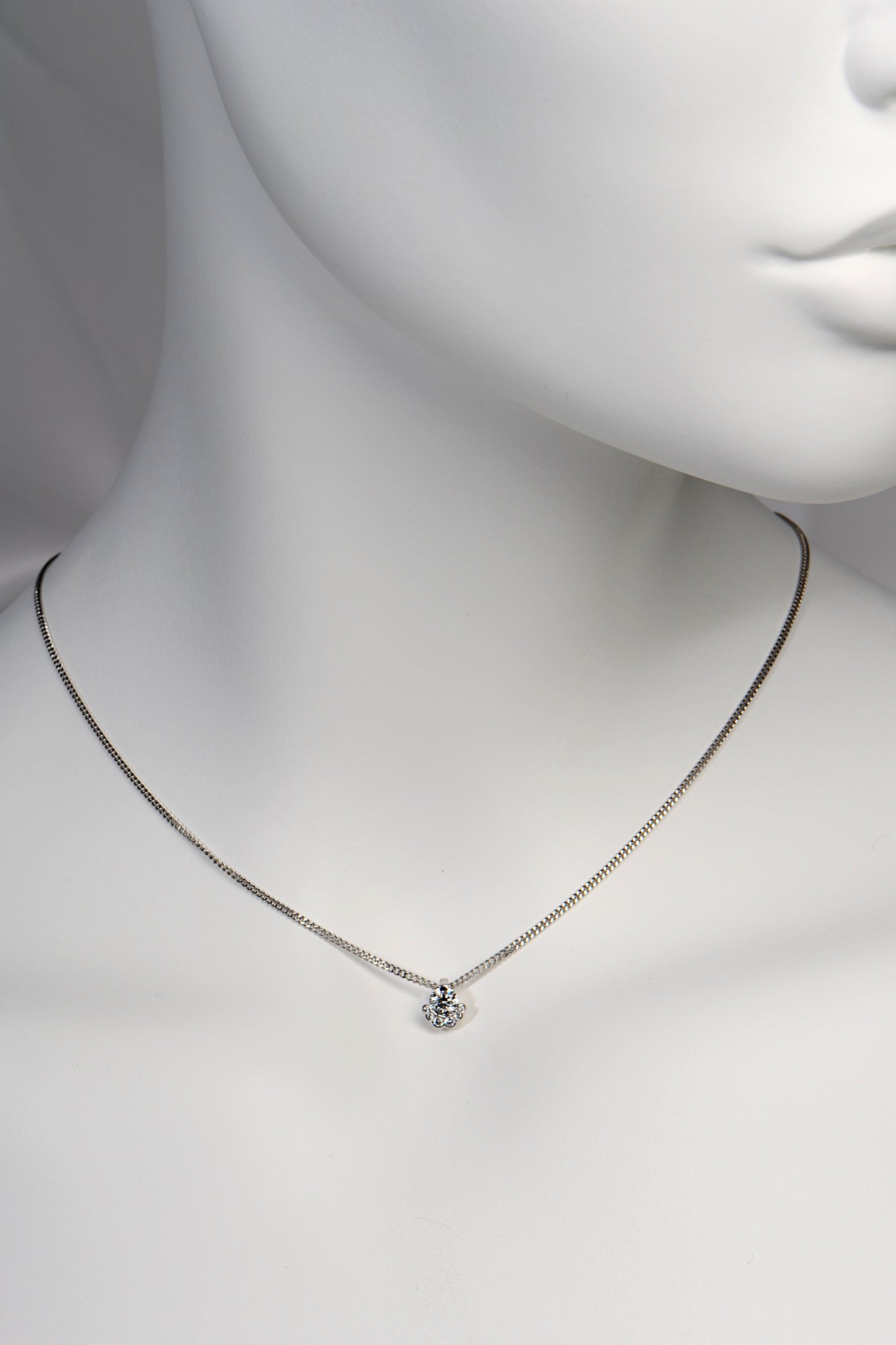 Scottish designer lab diamond platinum necklace that sits short at the clavicle. Can be order in longer lengths