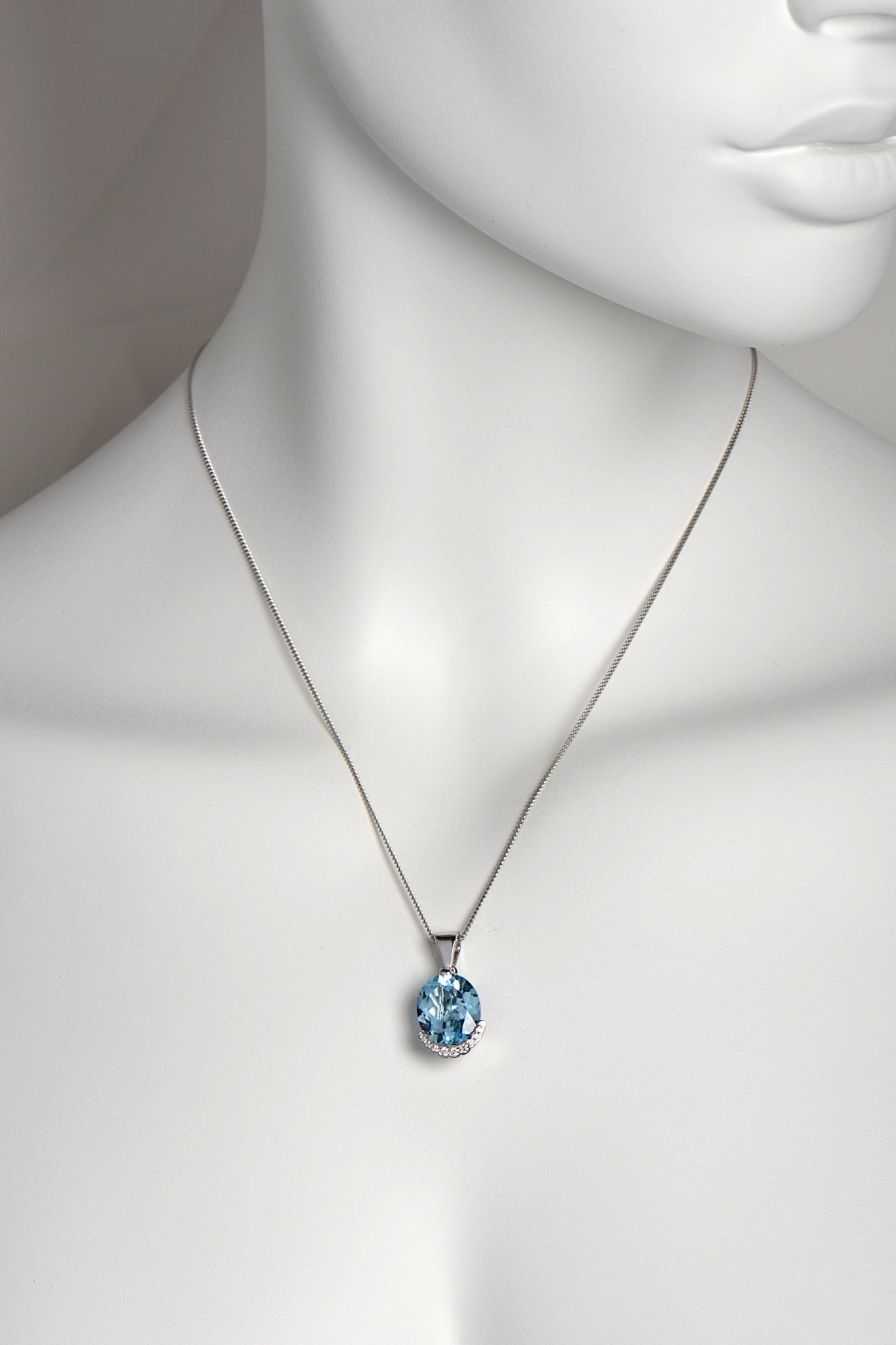large oval blue topaz and diamond scottish necklace by jewellery designer Christine Sadler