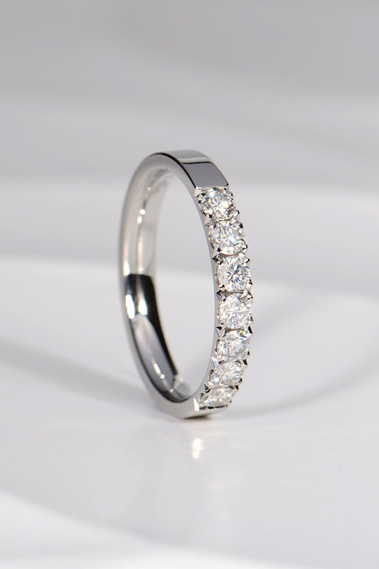 high quality handmade platinum and diamond ring that could be a wedding or eternity ring for a woman or a man