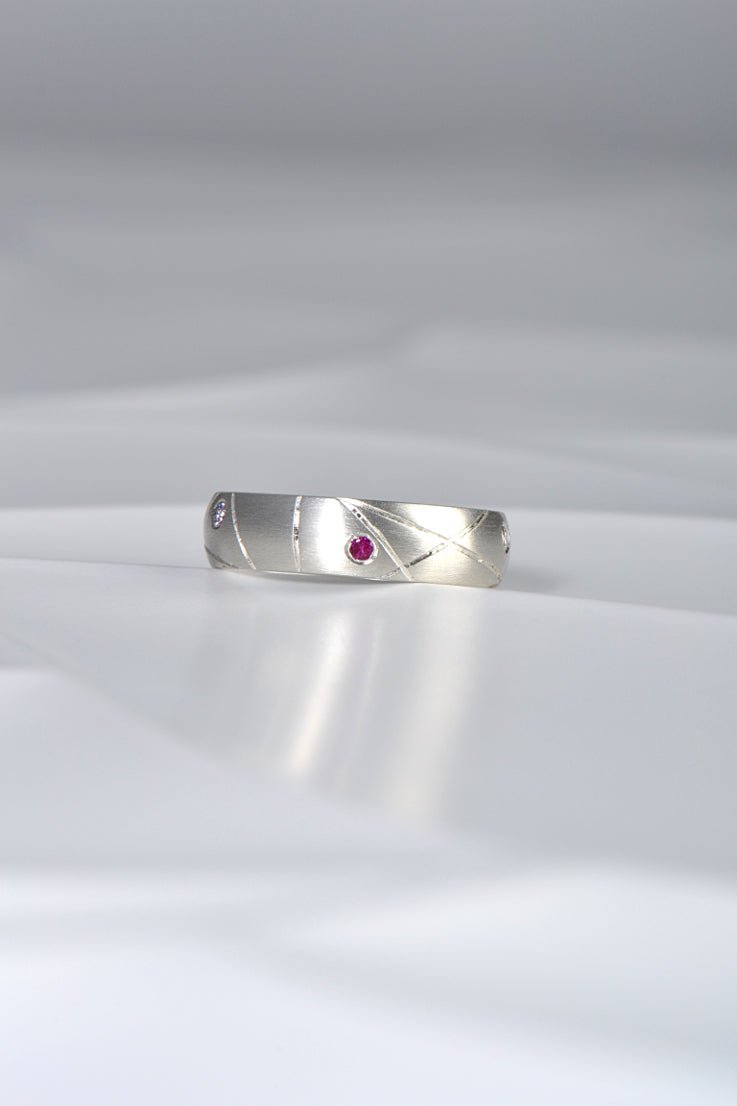 modern silver ring set with different coloured sapphires by Christine Sadler