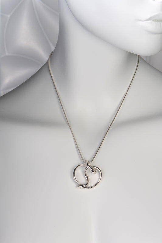 large unique real silver knot necklace exclusively available from UK jewellery designer Christine Sadler