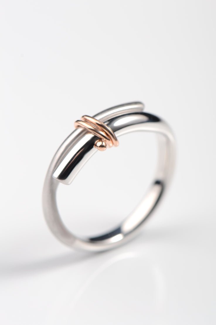 modern white and rose gold ring by British jewellery designer Christine Sadler