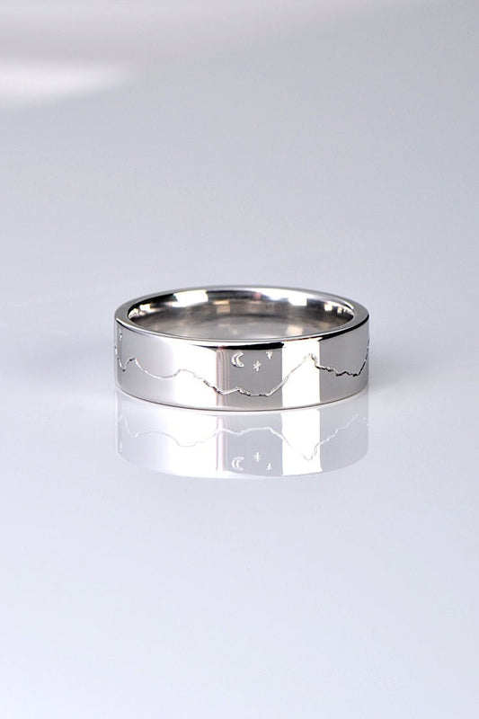handmade moon and stars mountain wedding ring that can be personalised with the mountain range of your choice