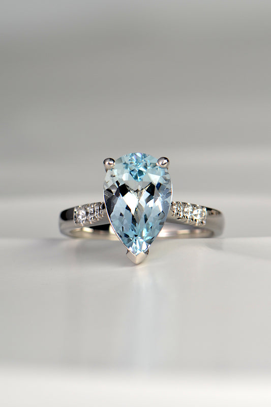 Aquamarine pear cut diamond platinum ring