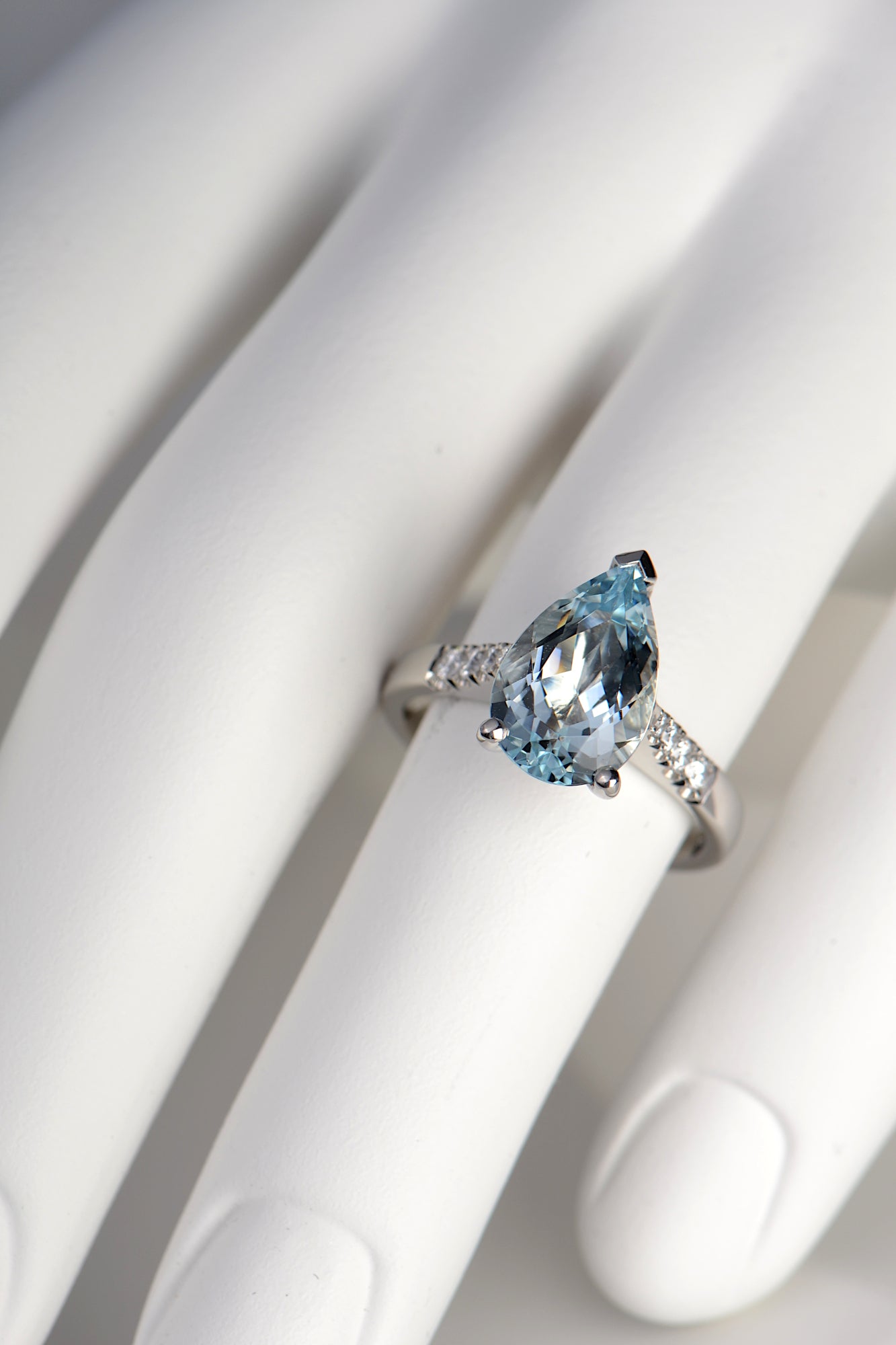 Aquamarine pear cut diamond platinum ring