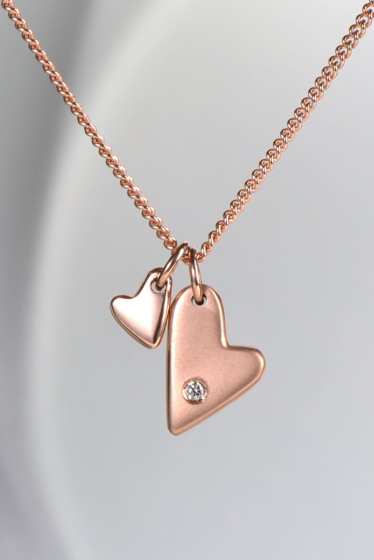 From The Heart 9ct rose gold two heart diamond pendant