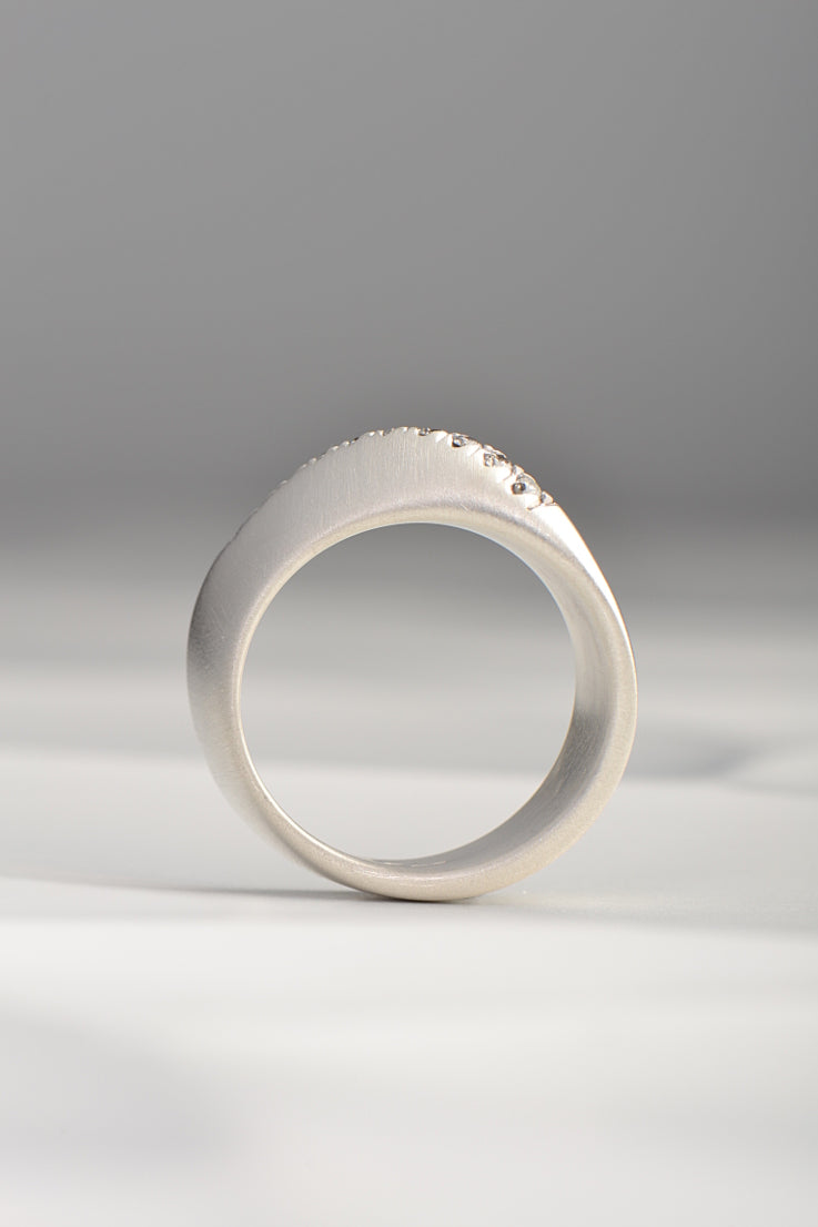 Silver and diamond embrace ring