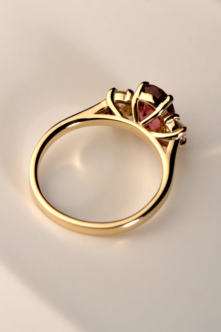 bright pink gemstone ring in yellow gold by designer Christine Sadler