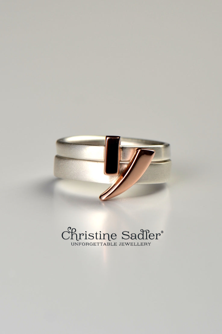 Cairn silver ring with rose gold detail