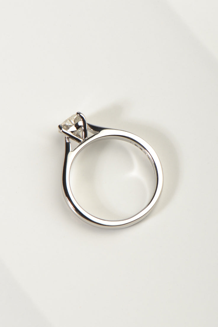 Platinum ring set with heart cut moissanite